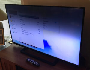 Television screen with bright blue spot caused by failing LED backlight